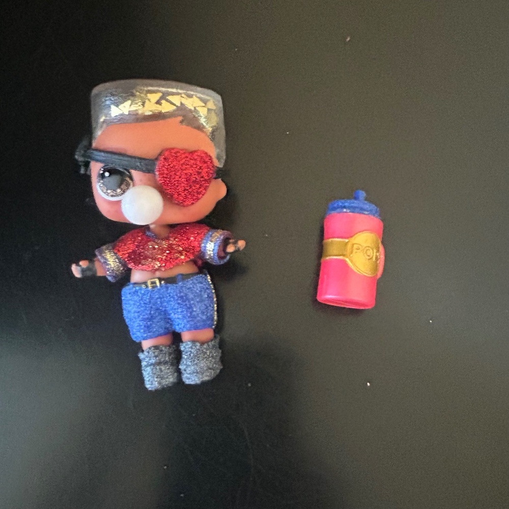 LOL Surprise Winter Disco Series Glitter “Soldier Boi” Doll.
